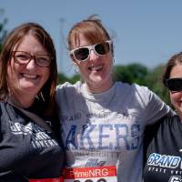 Three racers pose after the race.